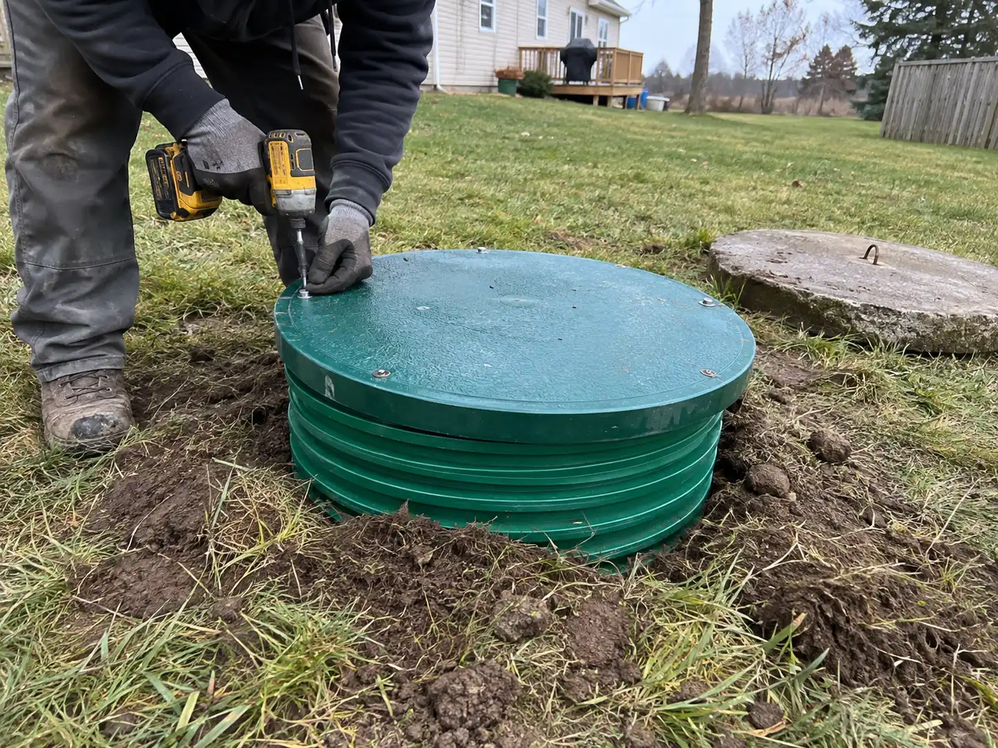 New septic tank riser and lid after a lid replacement